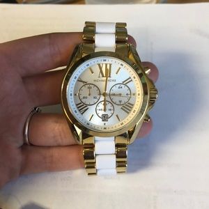 Gold and white Michael Kors watch